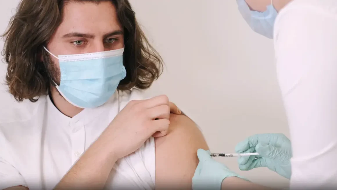 a patient getting a flu shot