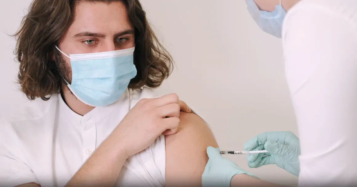 a patient getting a flu shot